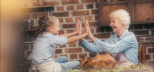 Little girl and grandmother at Thanksgiving