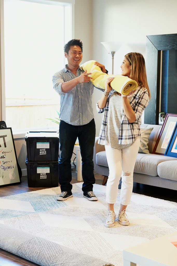 young couple moving out from their apartment in Los Angeles
